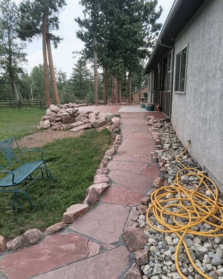 Flagstone patio with boulder border