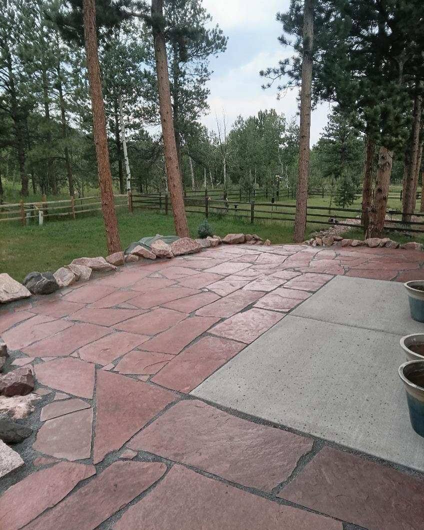 Flagstone walkway alongside a mountain home
